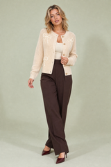 Gilet beige chiaro con fiocchi