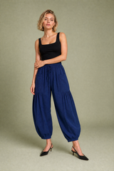Pantalone ampio a vita alta plissettato