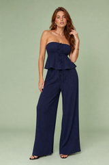 Completo pantalone largo bustier volant
