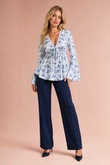 Blusa floreale scollo a V maniche svasate