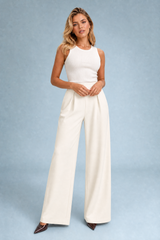 Pantaloni beige a vita alta e a gamba larga