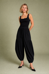 Pantalone ampio a vita alta plissettato
