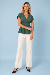 Blusa con scollo a V e vita cinta
