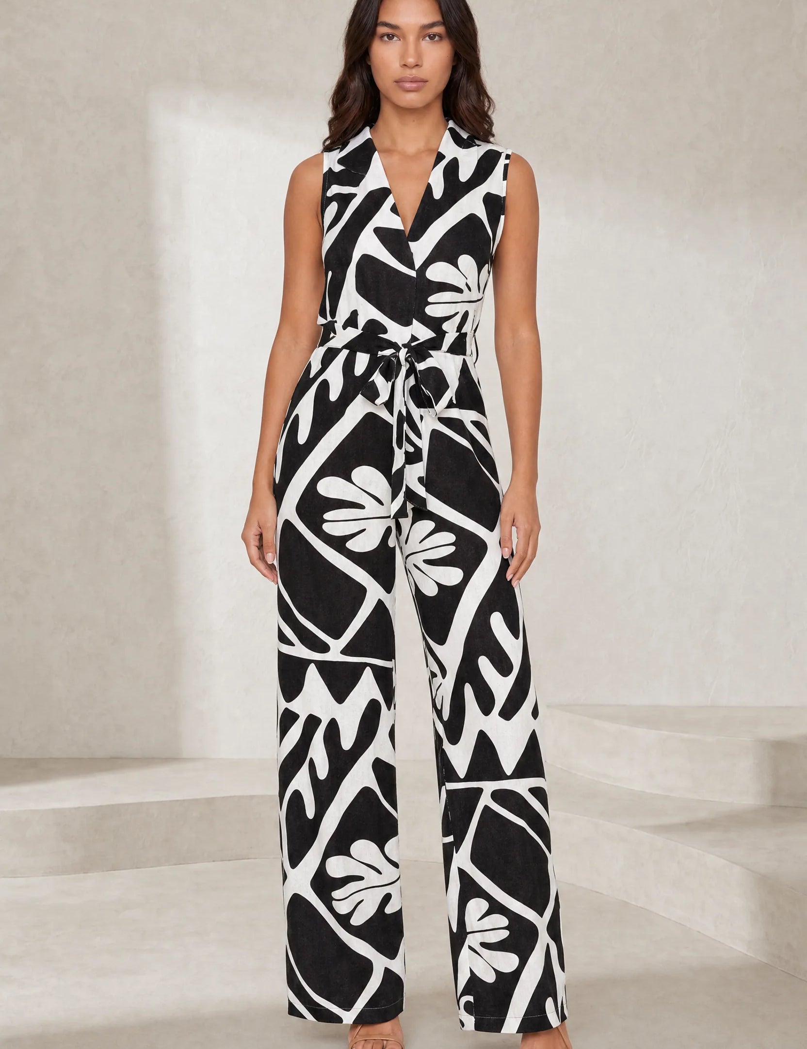 Combinaison noire col V ceinturée | Lounelle Paris