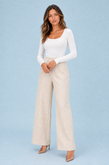 Pantalone largo a vita alta con bottone