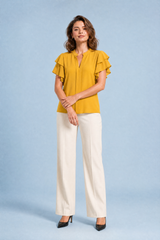 Blusa scollo a V con maniche a volant