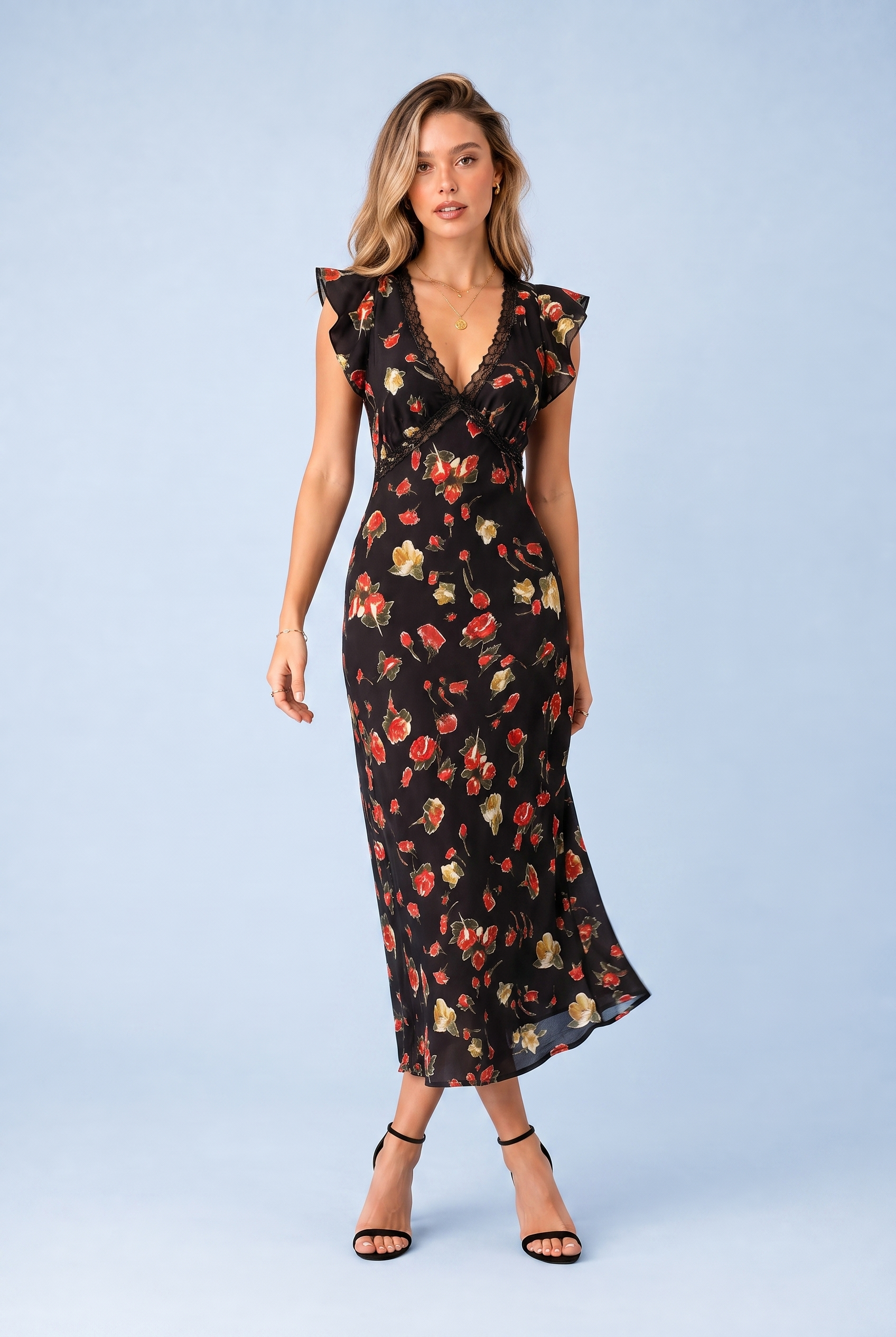 Robe noire florale à volants | Vue en mouvement | Lounelle Paris