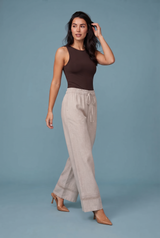 Pantaloni larghi beige vita alta