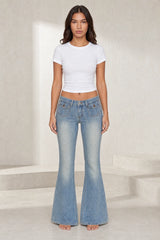 Jean bleu délavé taille basse évasé