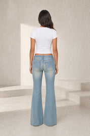 Jean bleu délavé taille basse évasé | Lounelle Paris