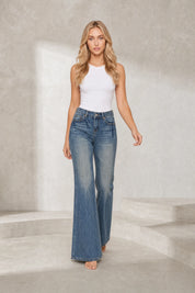 Jean flare bleu foncé taille mi-haute | Lounelle Paris