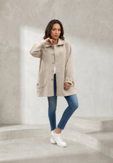 Manteau beige ample col à revers