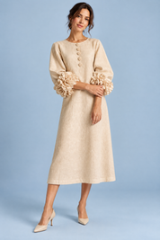 Robe midi beige coupe trapèze à manches bouffantes | Vue de face | Lounelle Paris