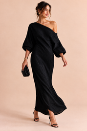 Robe asymétrique noire à épaule dénudée | Vue en mouvement | Lounelle Paris