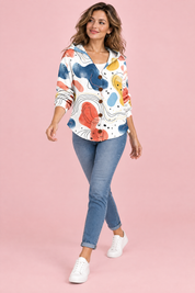 Gilet à capuche blanc à fleurs | Vue en mouvement | Lounelle Paris