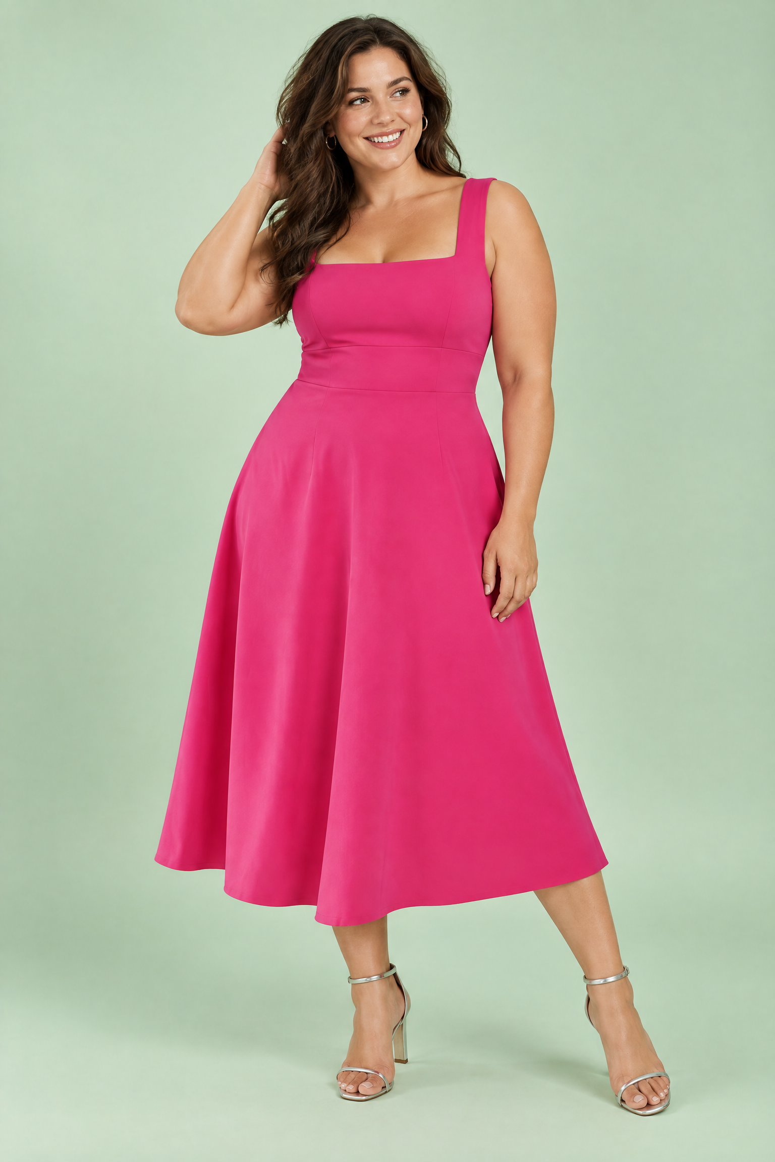 Robe midi rose vif à fines bretelles et jupe évasée | Porté sur une silhouette plus ronde | Lounelle Paris