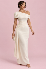 Abito midi asimmetrico color crema con drappeggio