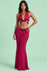 Set magenta con top all’americana e gonna lunga drappeggiata