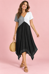 Abito midi nero asimmetrico con scollo a V