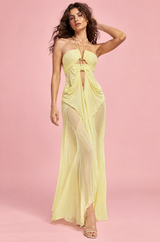 Abito lungo giallo asimmetrico con cut-out