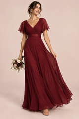 Abito bordeaux plissettato con scollo a V