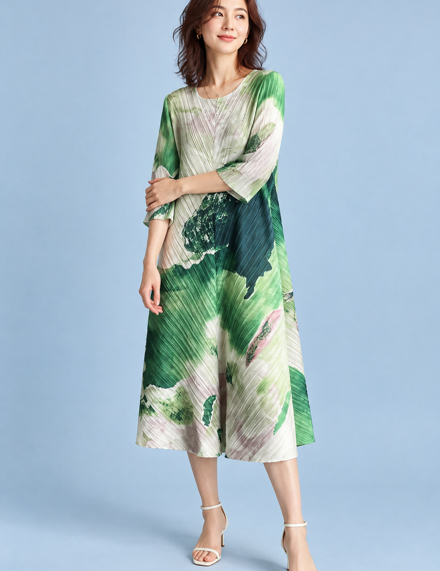 Robe midi plissée verte à imprimé abstrait | Vue de face | Lounelle Paris