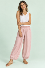 Pantaloni cropped rosa a gamba larga
