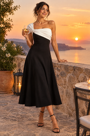 Robe midi noire et blanche asymétrique à une épaule | Deuxième photo lifestyle | Lounelle Paris