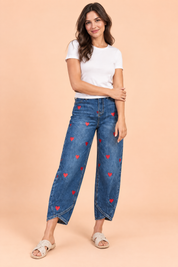 Pantalon bleu à imprimé floral et ourlet fendu | Vue de face | Lounelle Paris