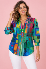 Camicia verde petrolio con stampa geometrica e abbottonatura frontale