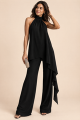 Completo fluido nero con pantaloni e top smanicato