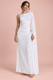 Robe longue blanche à col montant, détails drapés et manches cape | Vue de face | Lounelle Paris