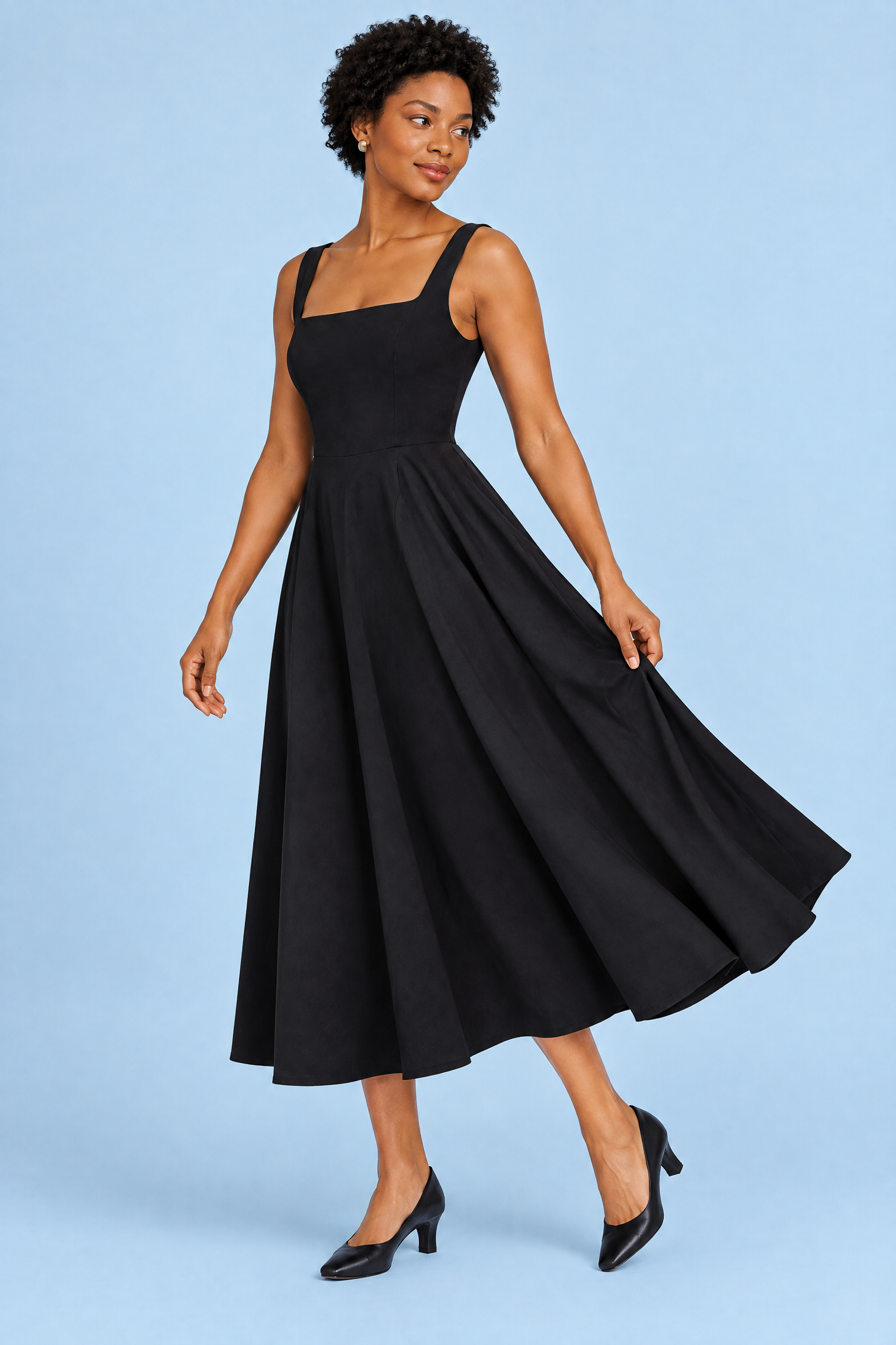 Robe midi noire à fines bretelles et ourlet ample | Vue de dos | Lounelle Paris