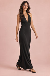 Robe longue noire à fronces et col V | Vue en mouvement | Lounelle Paris
