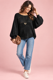 Pull noir oversize ajouré à col bateau | Vue de face | Lounelle Paris