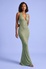 Abito lungo verde con paillettes e scollo all’americana