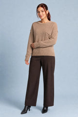 Pull ampio con tasca sul petto