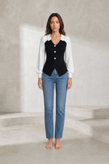 Pull bicolore col en V