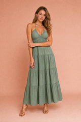 Abito lungo con scollo halter e schiena nuda